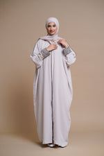 Load image into Gallery viewer, Embellished pearl gray abaya with handwork and olive piping.
