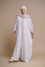 Load image into Gallery viewer, Embellished pearl gray abaya with handwork and olive piping.
