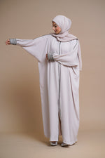 Load image into Gallery viewer, Embellished pearl gray abaya with handwork and olive piping.
