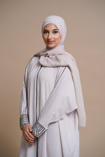 Load image into Gallery viewer, Embellished pearl gray abaya with handwork and olive piping.
