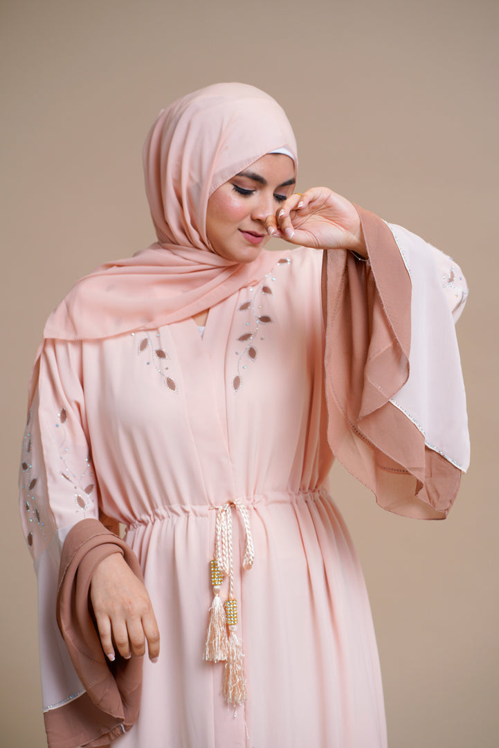 Embellished contrast-color abaya with laser-cut work