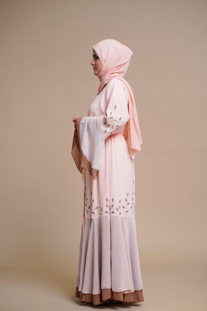 Embellished contrast-color abaya with laser-cut work