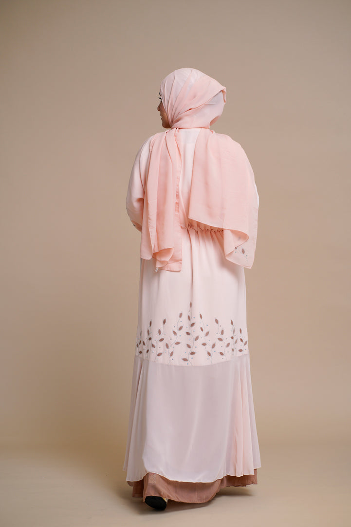 Embellished contrast-color abaya with laser-cut work