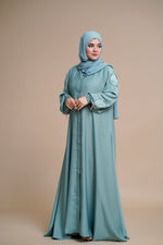 Load image into Gallery viewer, Organza flower embellished luxury abaya with hand and back embellishments.
