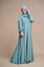 Load image into Gallery viewer, Organza flower embellished luxury abaya with hand and back embellishments.
