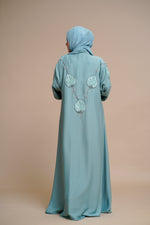 Load image into Gallery viewer, Organza flower embellished luxury abaya with hand and back embellishments.
