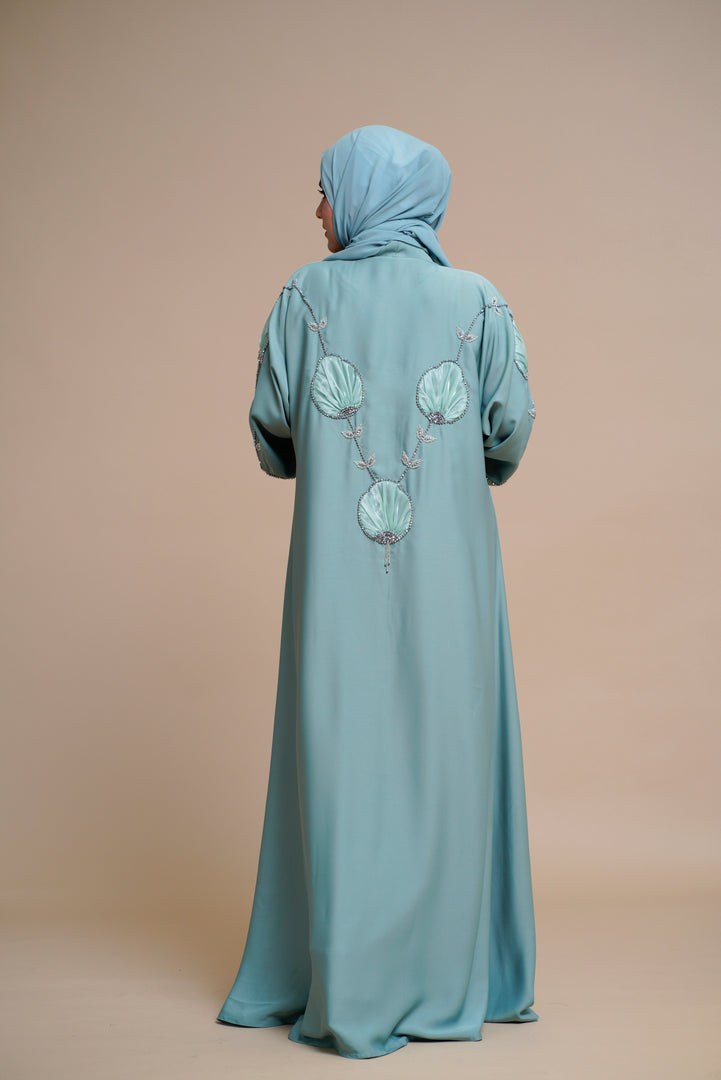 Organza flower embellished luxury abaya with hand and back embellishments.