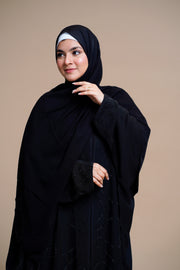 Meticulously designed with intricate stonework adorning both the front and back.