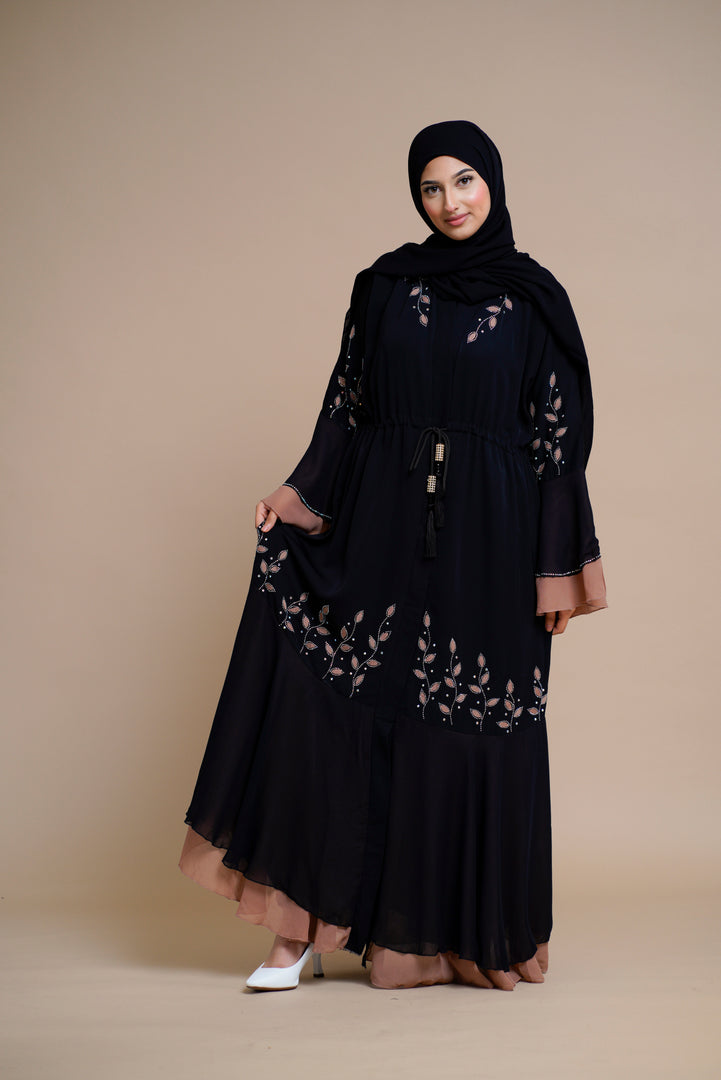 Embellished contrast-color abaya with laser-cut work