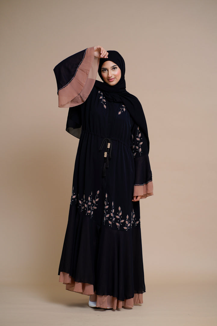 Embellished contrast-color abaya with laser-cut work