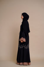 Load image into Gallery viewer, Embellished contrast-color abaya with laser-cut work
