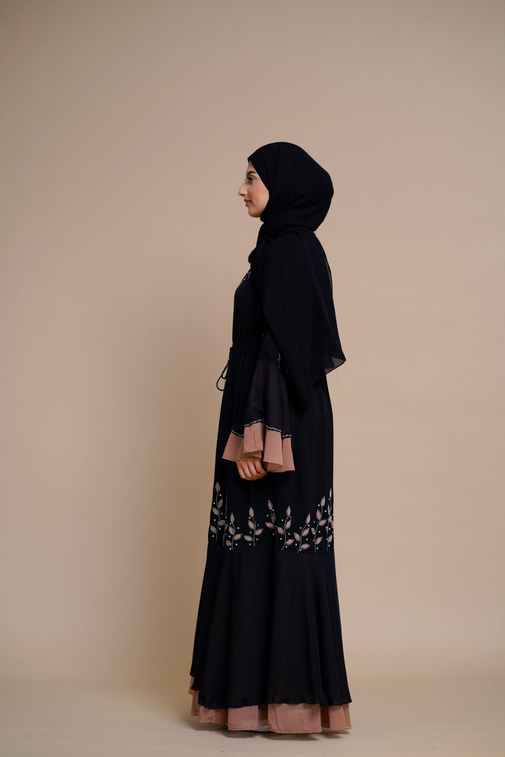 Embellished contrast-color abaya with laser-cut work