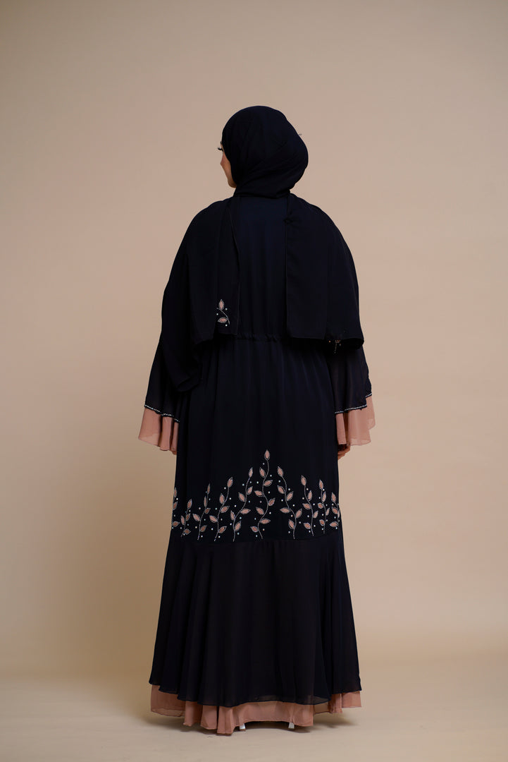 Embellished contrast-color abaya with laser-cut work