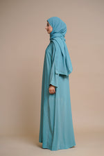 Load image into Gallery viewer, Embellished shiny closed Abaya (Blue)
