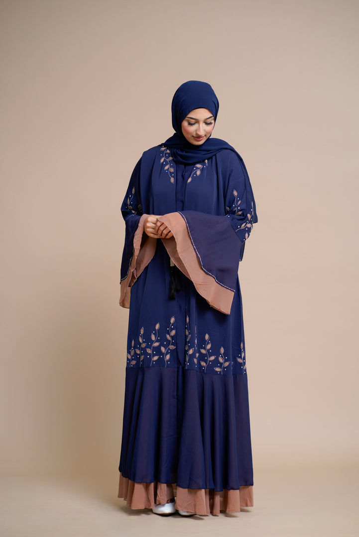 Embellished contrast-color abaya with laser-cut work