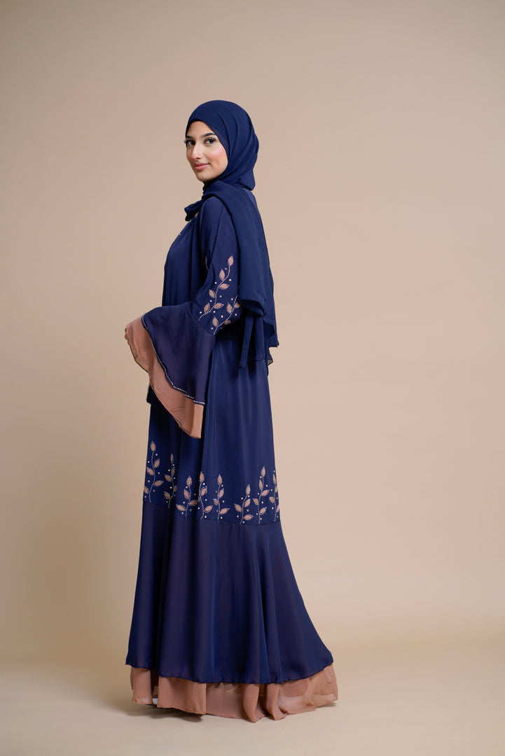 Embellished contrast-color abaya with laser-cut work