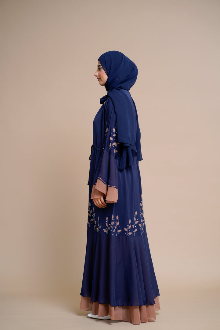 Embellished contrast-color abaya with laser-cut work