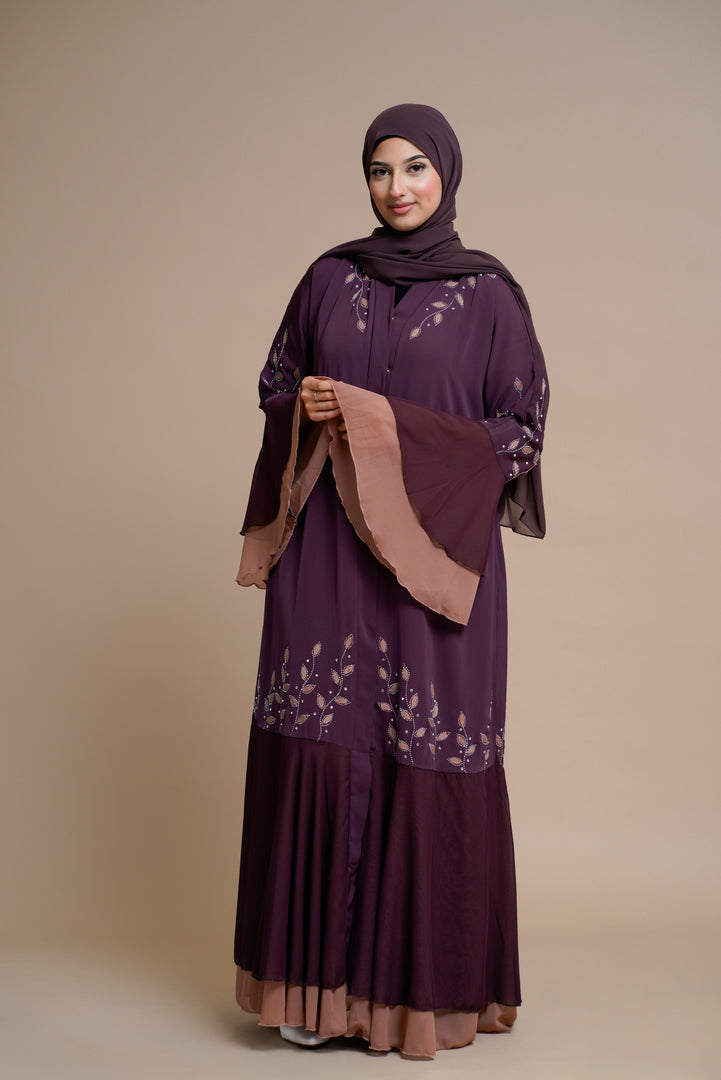 Embellished contrast-color abaya with laser-cut work