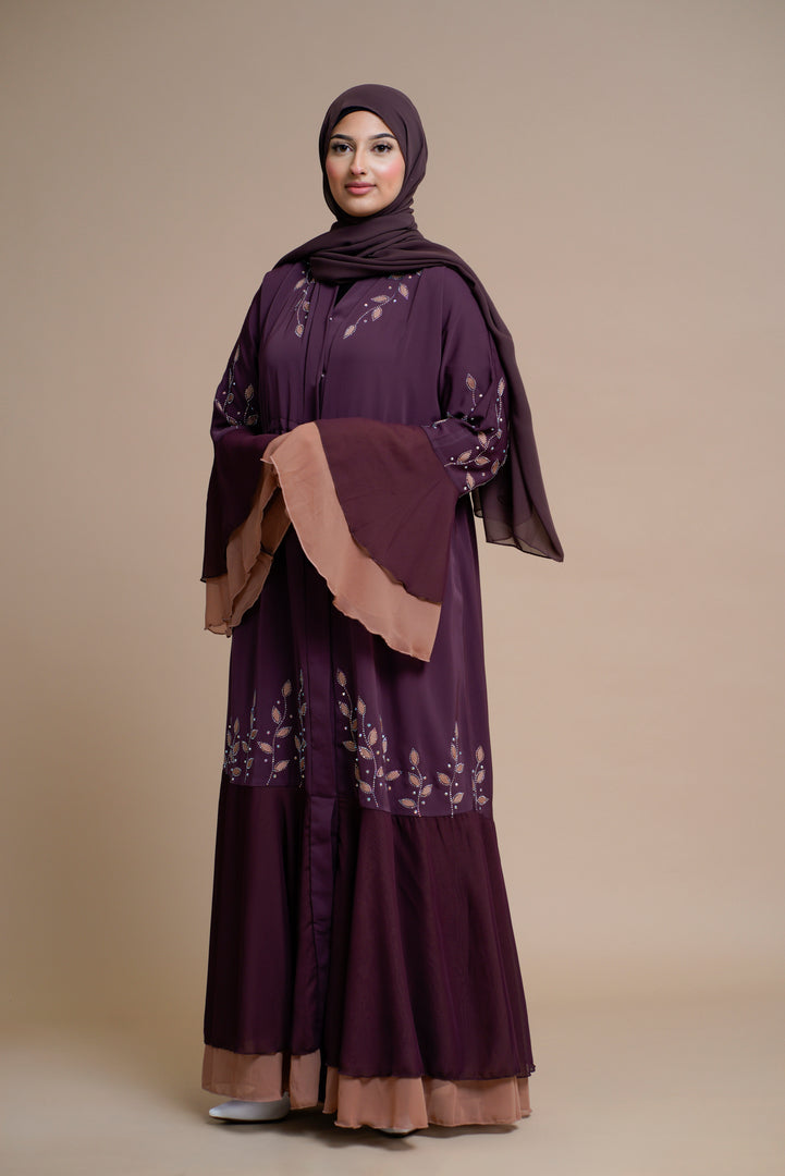 Embellished contrast-color abaya with laser-cut work