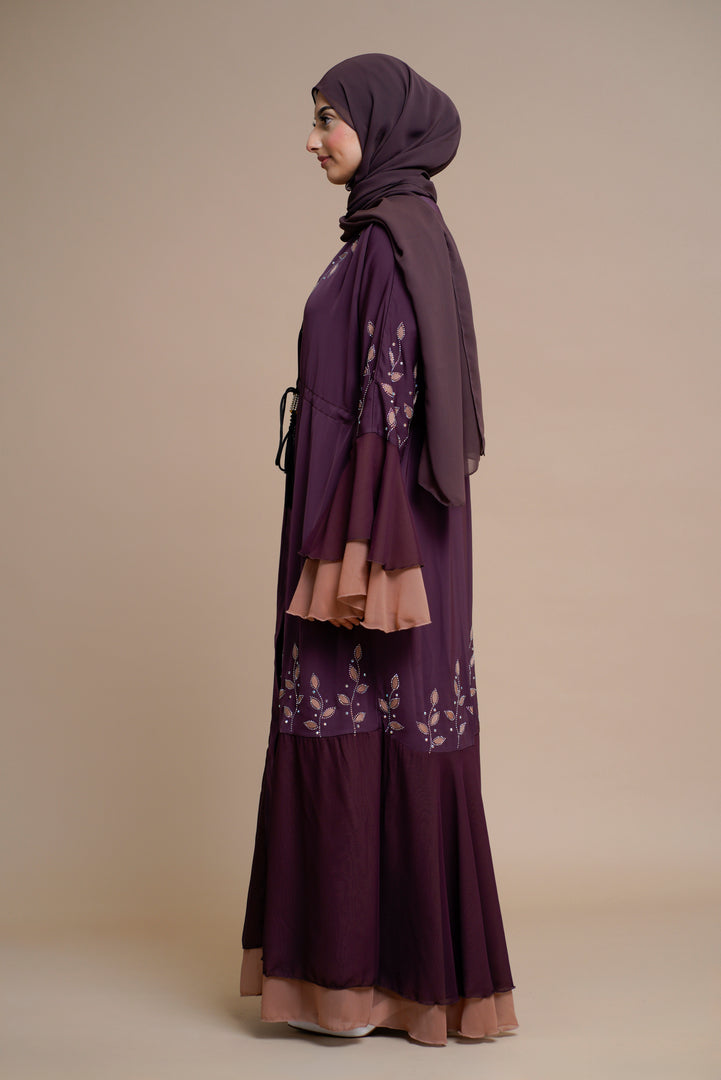 Embellished contrast-color abaya with laser-cut work