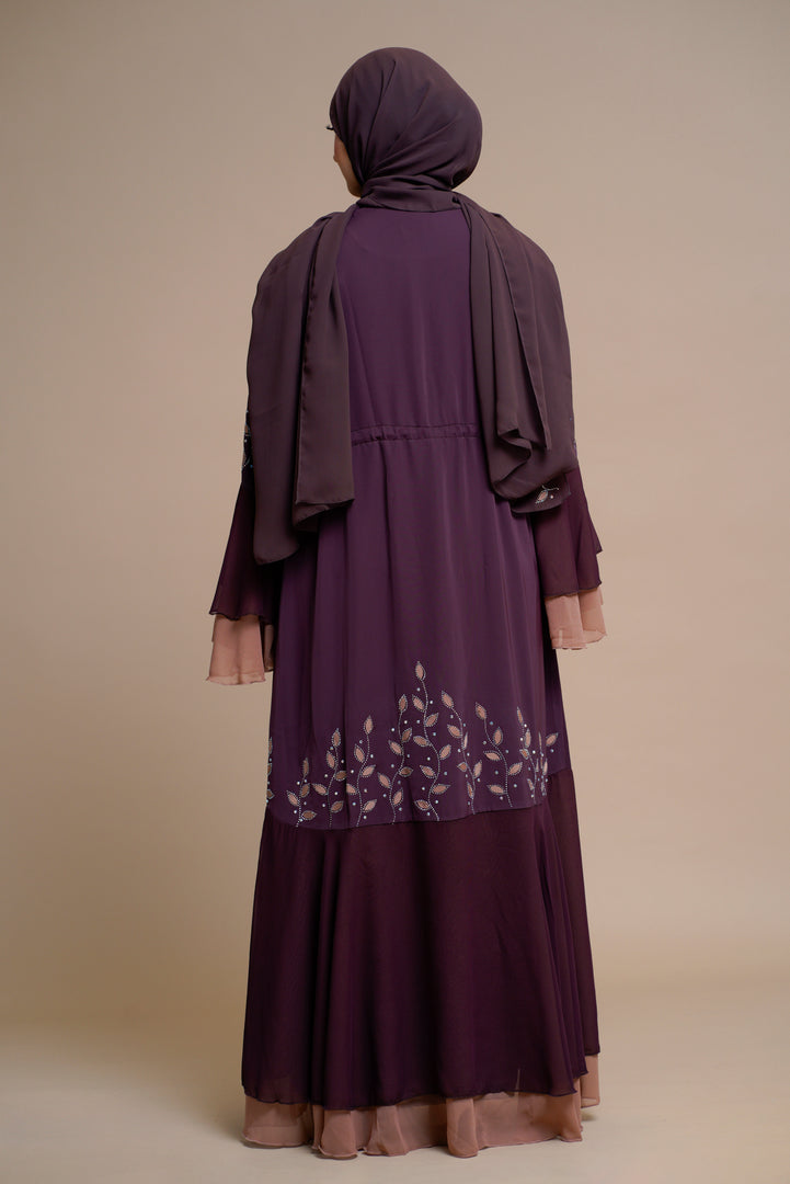 Embellished contrast-color abaya with laser-cut work